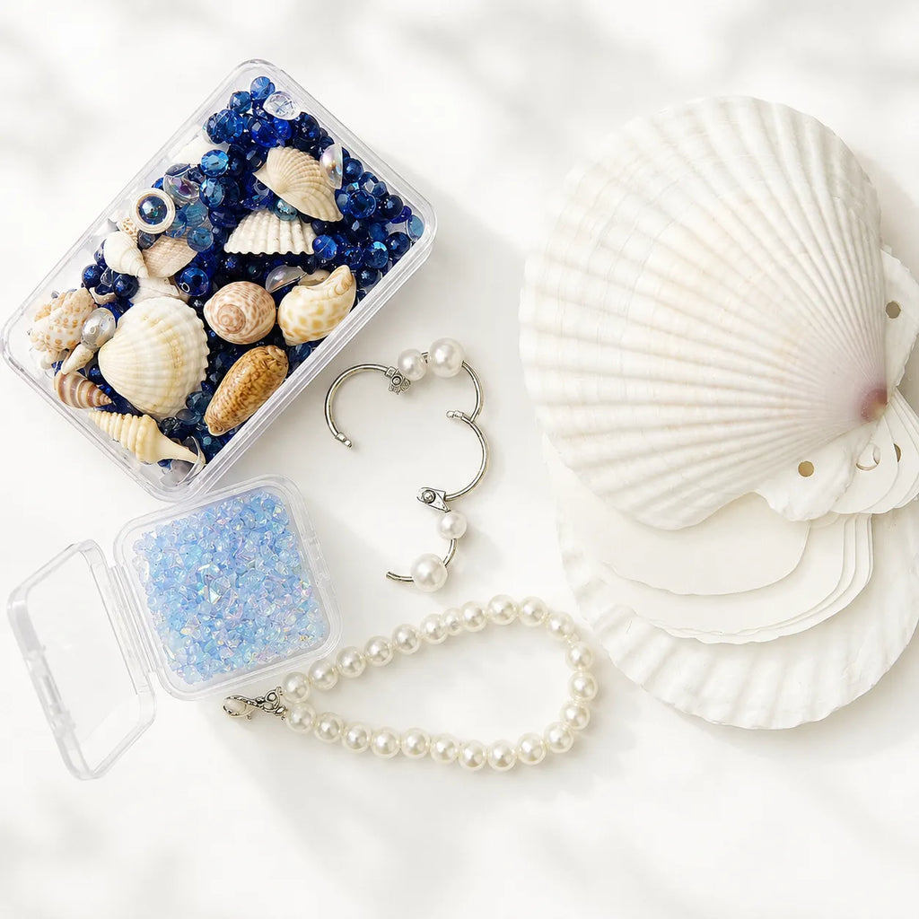 Pearl necklace with seashells and blue beads on a white background